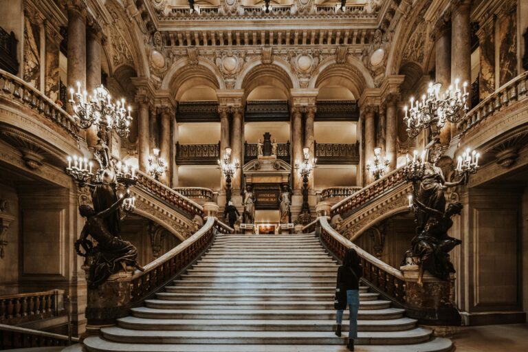 Elegant baroque architecture of the iconic Palais Garnier staircase in Paris, France.